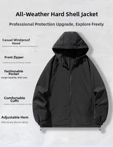 Detail view of the waterproof black hooded jacket featuring a smooth zipper and side pockets