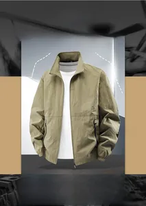 Detail of khaki outdoor jacket showing stand collar design and durable zipper stitching