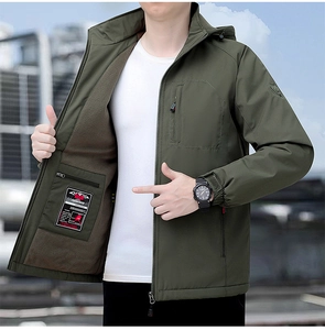 Detailed view of the olive green outdoor jacket with warm brown fleece lining and inner pocket