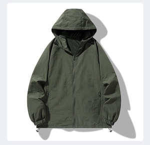 Detail of army green hooded sun protection jacket with zip pockets and drawstring