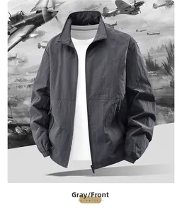 Close-up of gray outdoor jacket featuring a standing collar and elastic cuffs design
