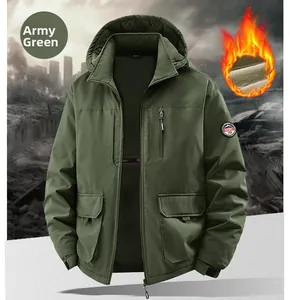 Detail of army green tactical jacket with fleece lining and Free Spirit arm patch