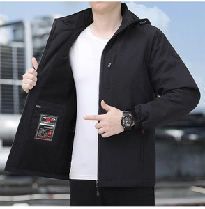 Detail of men's outdoor windbreaker with fleece lining and removable hooded design