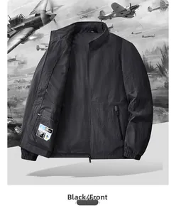 Detail of internal zippered security pocket and size label on black outdoor jacket