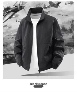 Detail of men black outdoor jacket featuring stand collar and functional zip pockets
