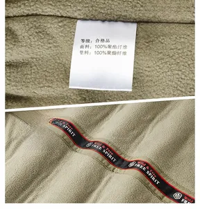 Detail of warm fleece lining with Wild & Free decorative ribbon on men's winter jacket