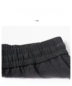 Detail display of black elastic waistband with high-quality textured woven fabric