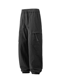 Men's cargo joggers in charcoal black featuring drawstring waist and large side zipper pockets