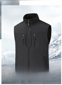 Close-up of black fleece-lined vest with high collar and functional zipper pockets