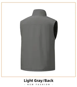Detail view of light grey vest back with professional stitching and windproof fabric