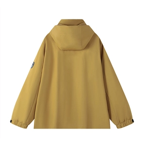 Back view of mustard yellow hooded windbreaker jacket with adjustable velcro cuffs
