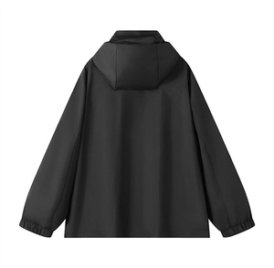 Back view of a black hooded windbreaker jacket with elastic cuffs and waterproof fabric