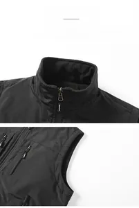 Detailed view of black outdoor vest featuring a stand-up collar and secure zipper pocket