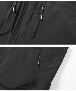 Close-up of waterproof fabric and multi-pocket zippers with reflective pull cords