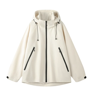 Detail of off-white windbreaker jacket showing black contrast zipper and hood drawstring