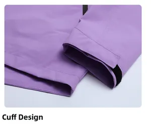 Detail view of adjustable velcro cuffs on the waterproof purple outdoor jacket