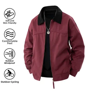 Detail of windproof burgundy leisure jacket with black collar and ribbed cuffs