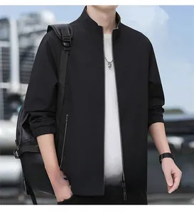 Close-up detail of the stand collar and metal zipper on this black fashion jacket