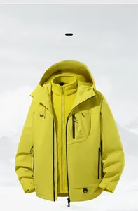 Detail of a yellow 3-in-1 waterproof jacket with windproof shell and warm fleece liner