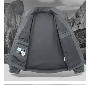 Detail of grey jacket showing breathable mesh lining and secure interior zipper pocket
