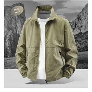 Detail of khaki windproof jacket featuring stand collar and textured waterproof fabric