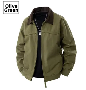 Detail view of olive green jacket with dark brown collar and metallic zipper texture