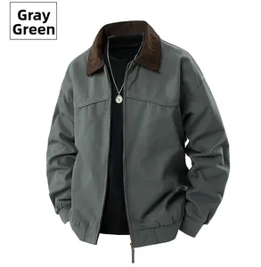 Detail of grey-green casual jacket featuring a brown corduroy collar and metal zipper