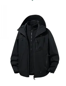 Detail of waterproof zippers and durable fabric on black 3-in-1 outdoor mountain jacket