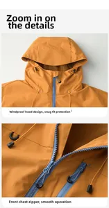 Close-up of orange outdoor jacket with blue zipper hood and windproof drawstring