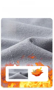 Detailaufnahme von grauem Waffel-Fleece-Futter für Wärme und thermische Isolierung