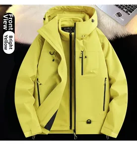Detail view of fluorescent yellow three-in-one jacket with waterproof zipper and hood