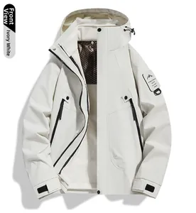 Detail of ivory outdoor 3-in-1 jacket with zip closure, sleeve patch, and velcro cuffs