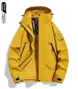 Detail of grapefruit yellow 3-in-1 outdoor jacket with fleece lining and mountain patch