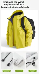 Detail of windproof hood rope, velcro cuffs and adjustable hem on yellow outdoor jacket