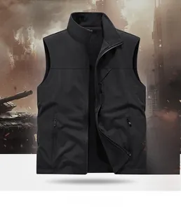 Detail of black reversible outdoor vest with fleece lining and three zipper pockets