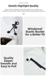 Close-up of white outdoor jacket detailing smooth black zippers and elastic drawstring toggles