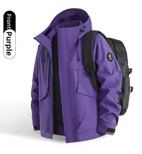 Detail view of purple waterproof hiking jacket with adjustable hood and velcro cuffs