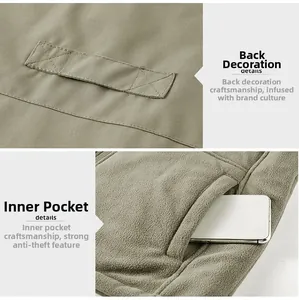 Detail view of khaki work vest featuring reinforced stitching and inner fleece phone pocket