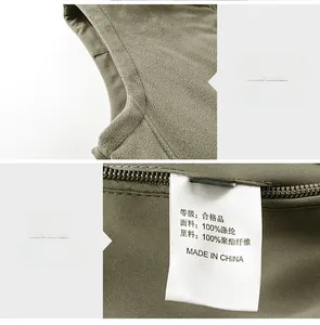 Detailed view of the 100% polyester fleece vest showing high-quality stitching and care label