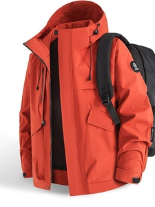 Waterproof outdoor mountain jacket in orange with adjustable hood and pockets