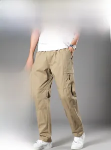 Detail view of khaki cotton cargo pants featuring functional side pockets and breathable fabric