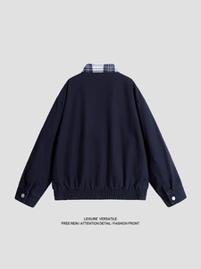 Men's navy utility bomber jacket featuring checkered collar and dual-layer design back view