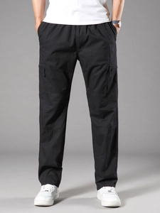 Men's casual black cotton cargo pants with drawstring waist and zip side pockets