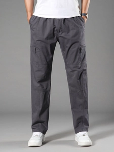 Men's dark gray cargo pants in loose straight fit with elastic drawstring waist and side pockets