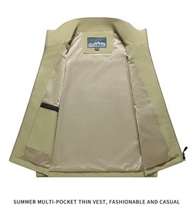 Detail of khaki outdoor vest showing breathable mesh lining and inner zipper pocket