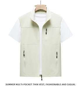 Detailed close-up of summer multi-pocket thin vest in light beige with durable zippers