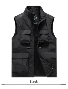 Detail of multi-pocket black tactical vest showing mesh lining and smooth metal zipper