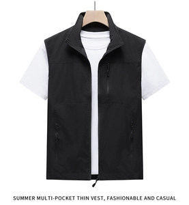 Detail view of lightweight black utility vest with multi-pocket design and stand collar