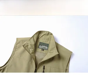 Detailed close-up of outdoor fishing vest featuring breathable mesh lining and zippered pocket