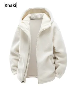 Close-up of thick khaki sherpa fleece jacket featuring elastic cuffs and zipper detail